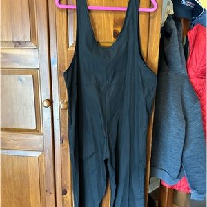 Black 1 piece baggy overall size large ( fits a medium for baggy look)